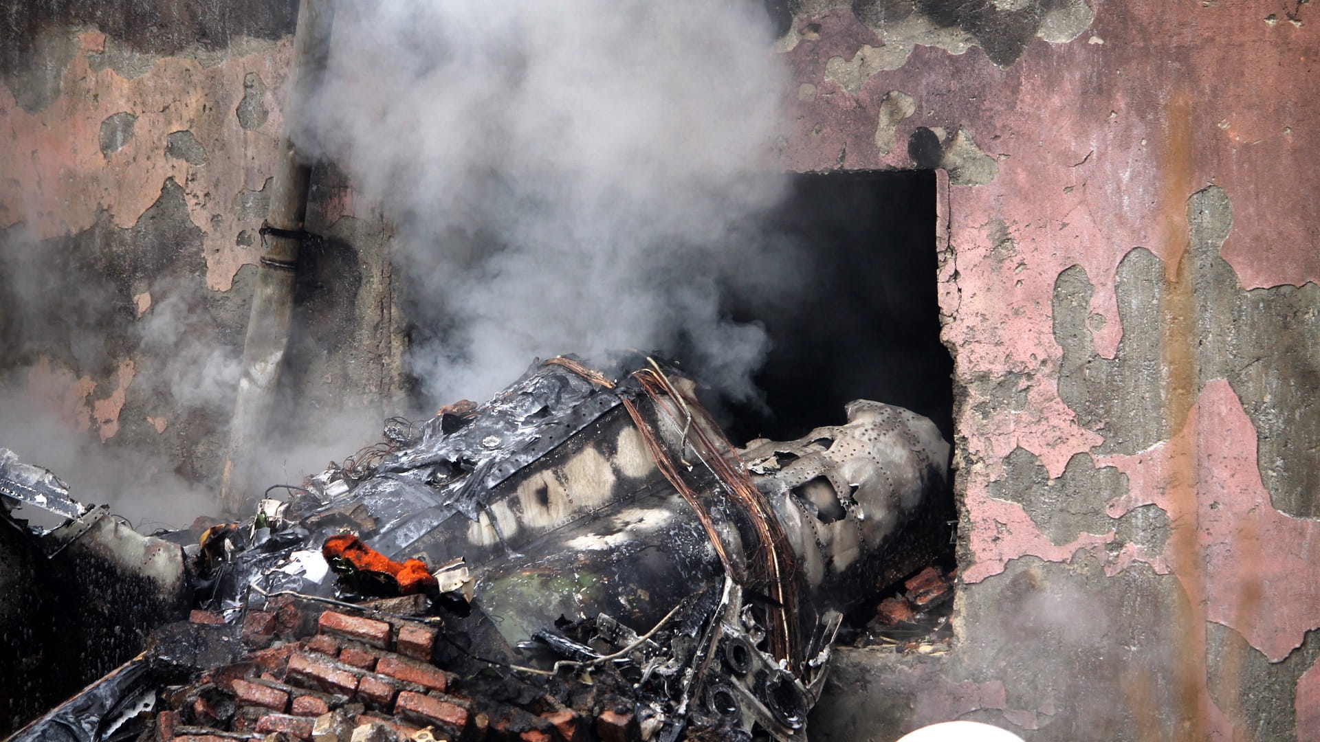 Image for the title: Iran fighter jet crashes, injuring two crew 