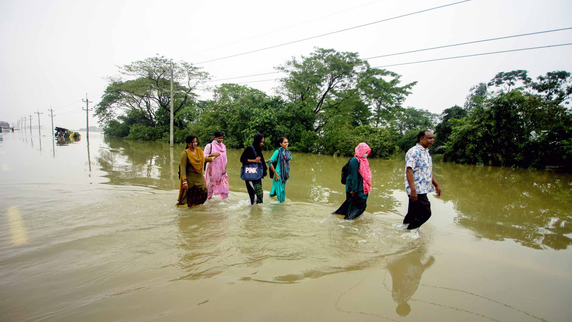 Image for the title: Monsoon floods kill 42 people in Bangladesh, India 