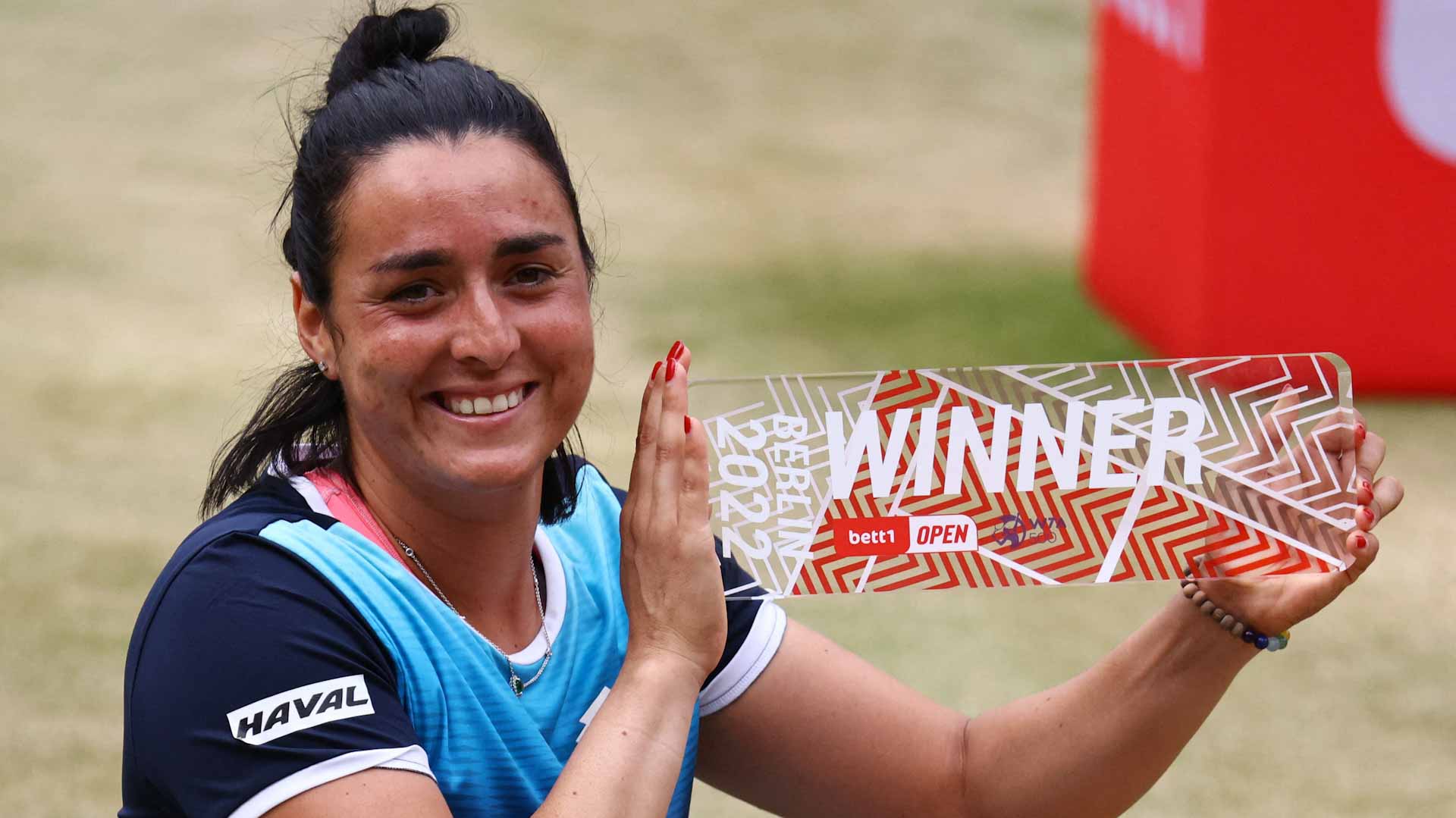 Image for the title: Jabeur wins Berlin title after Bencic retires injured 