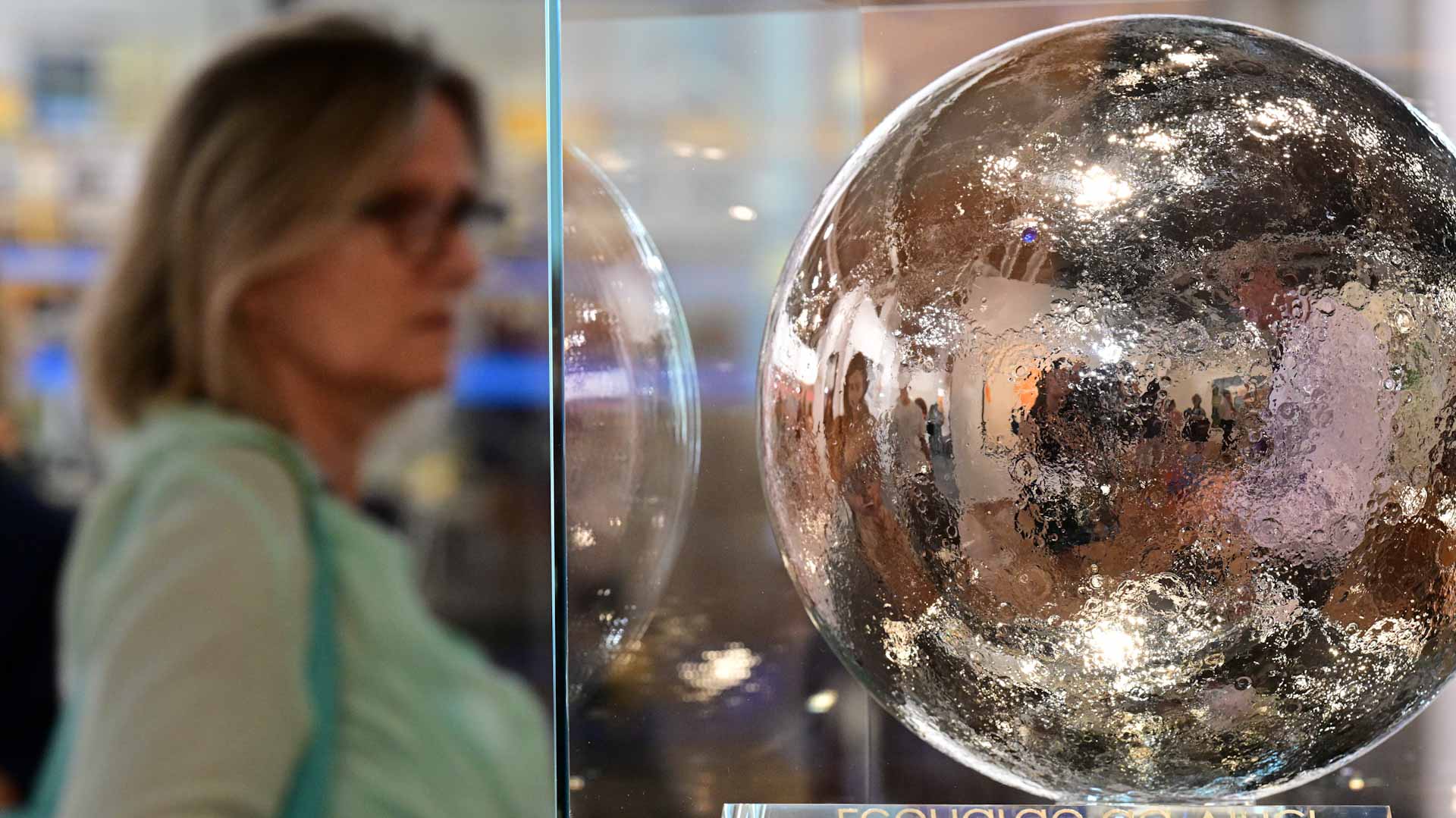 Image for the title: Moon sculptures, NFTs at futuristic Art Basel fair 