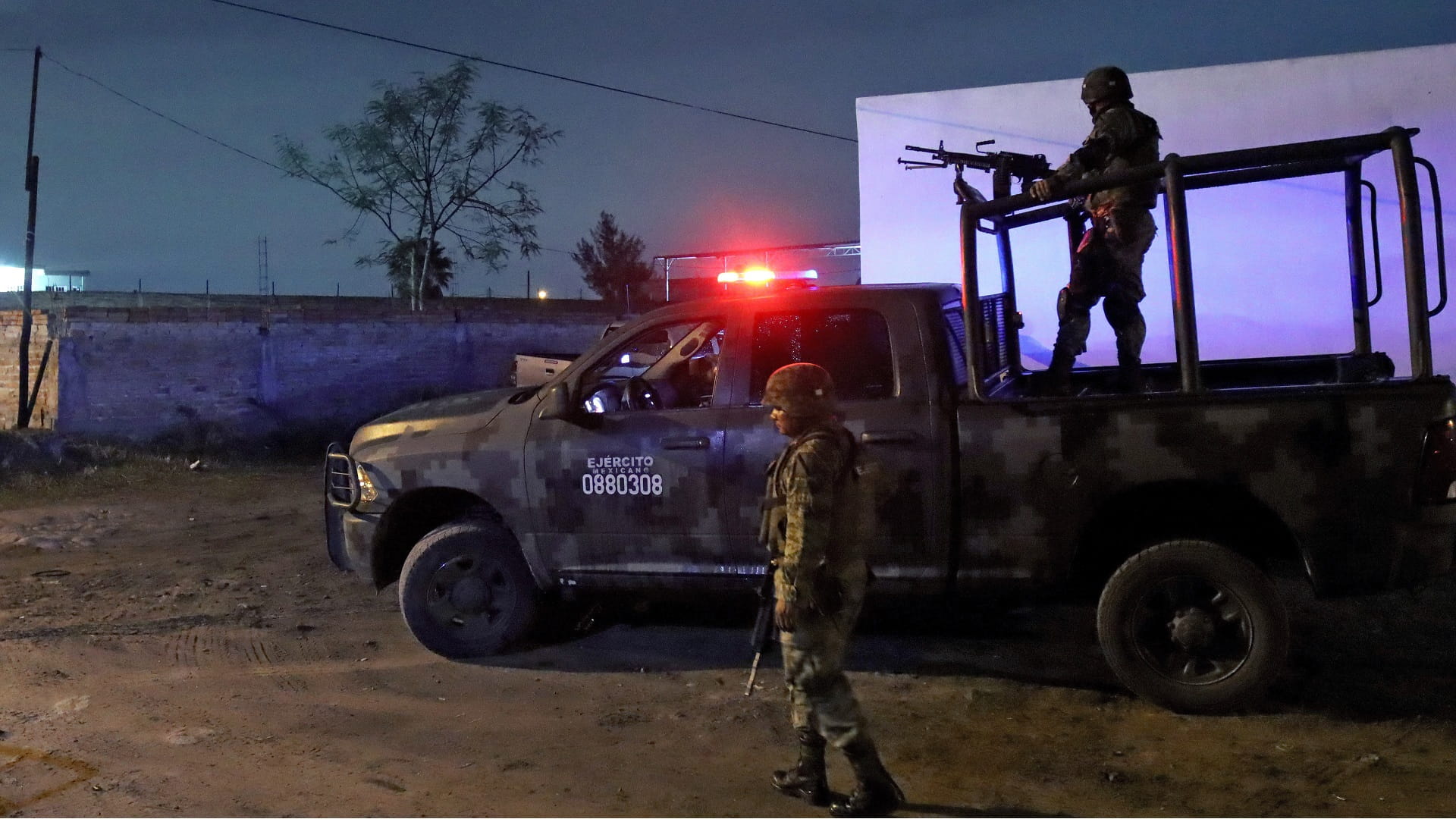 Image for the title: 12 dead as police clash with gang suspects in western Mexico 