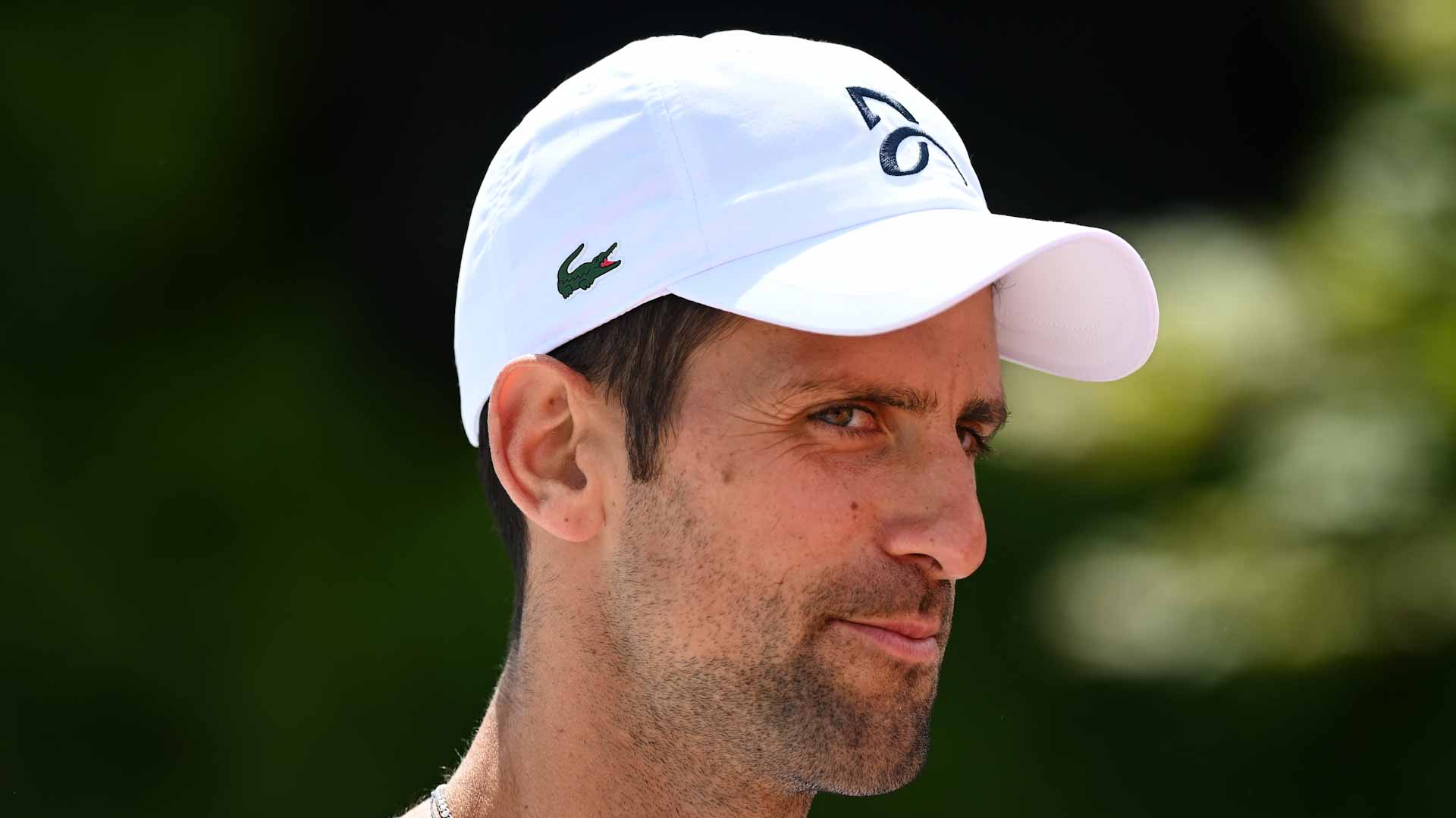 Image for the title: Djokovic brings curtain up on Wimbledon 