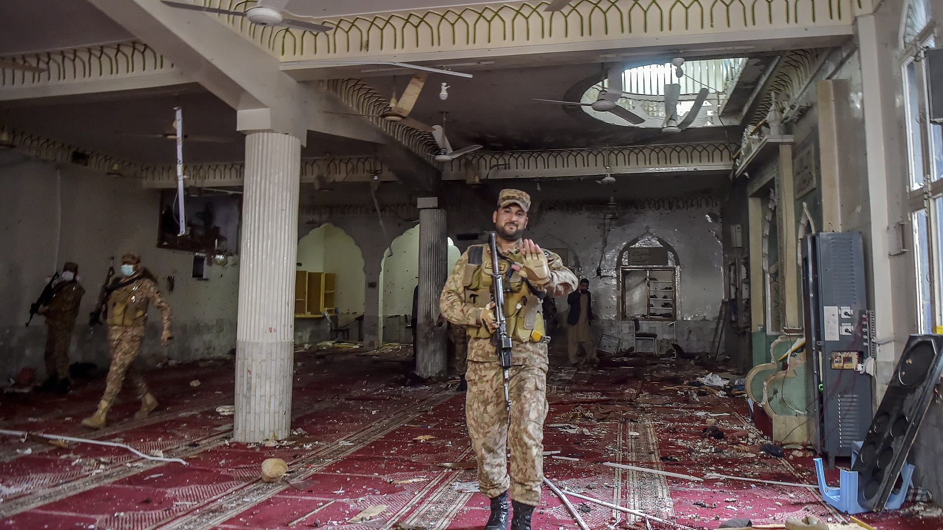 Image for the title: Pakistan mosque bombing toll rises to 56 dead, 194 wounded 