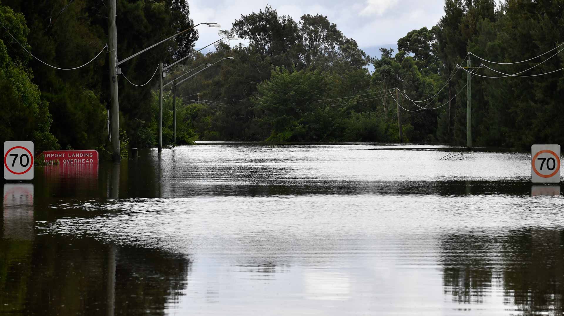 Image for the title: Flooded Australian towns brace for more rains 