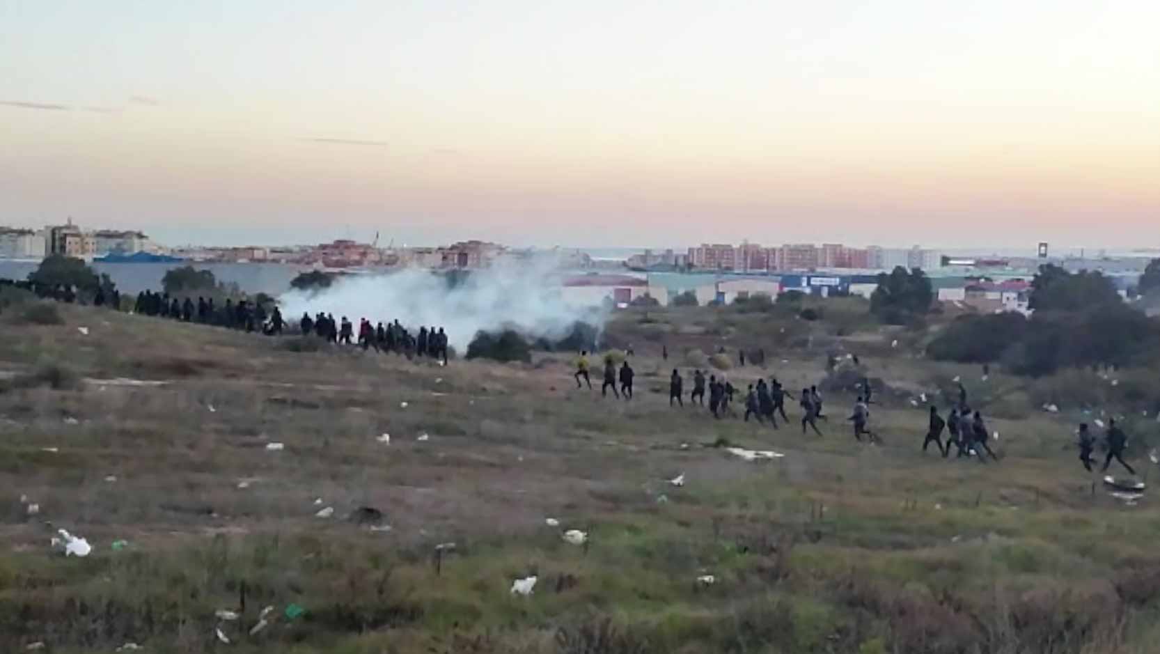 Image for the title: Migrants storm Spanish enclave for second day running 