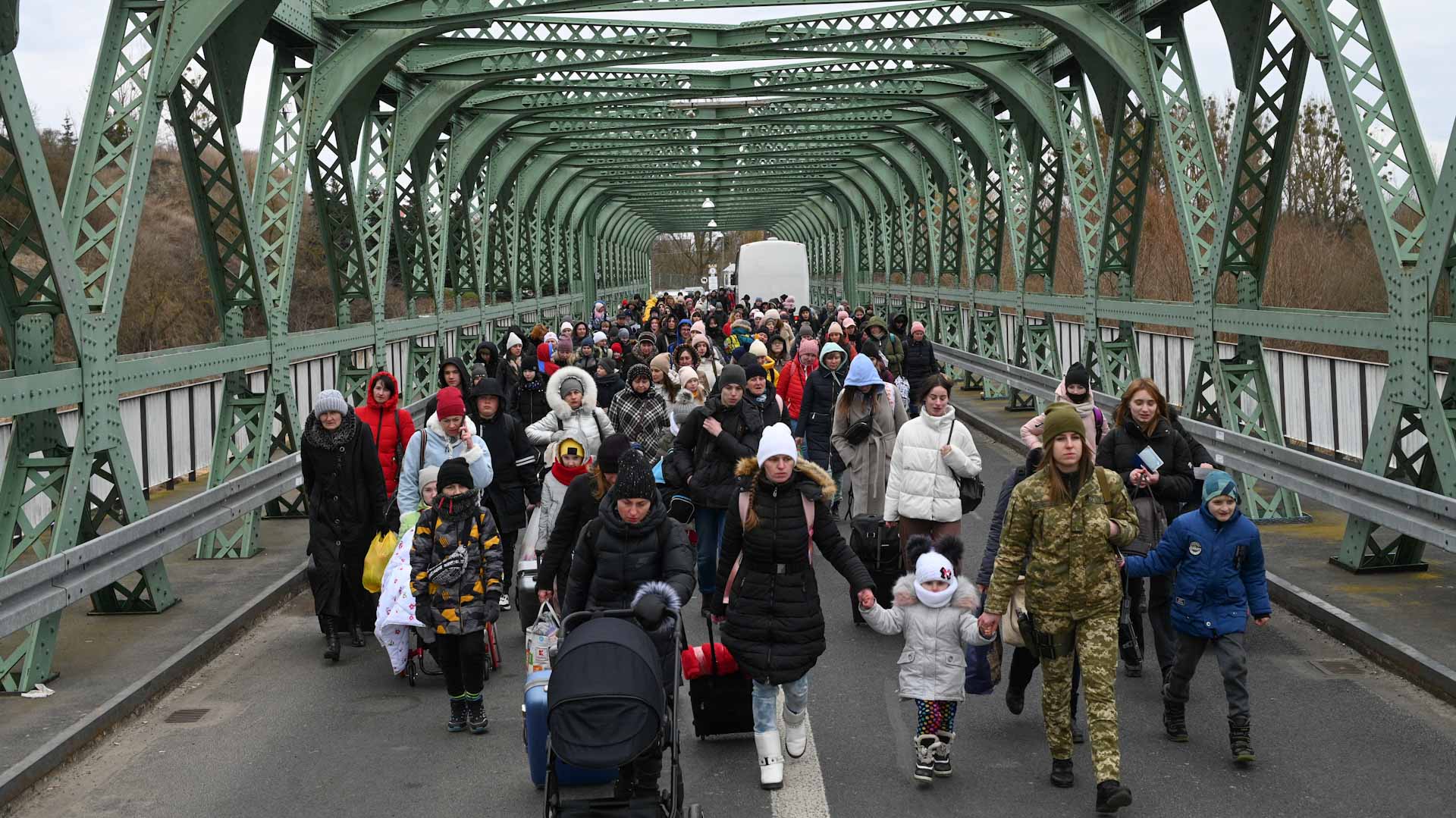 Image for the title: Poland opens doors as refugee count hits a million 