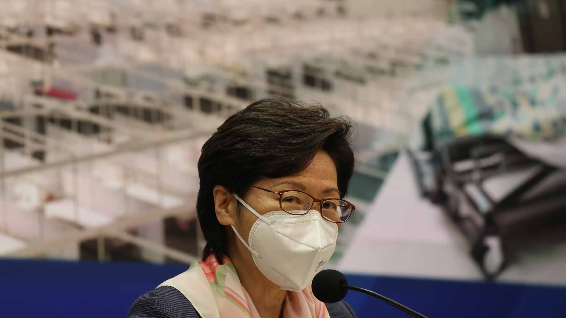 Image for the title: Hong Kong leader to review COVID restrictions in coming days 
