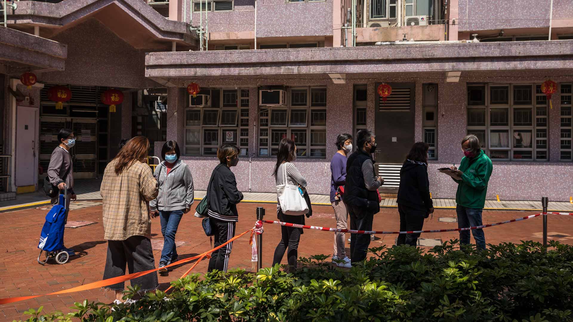 Image for the title: China locks down city of 9 million as virus ripples across country 