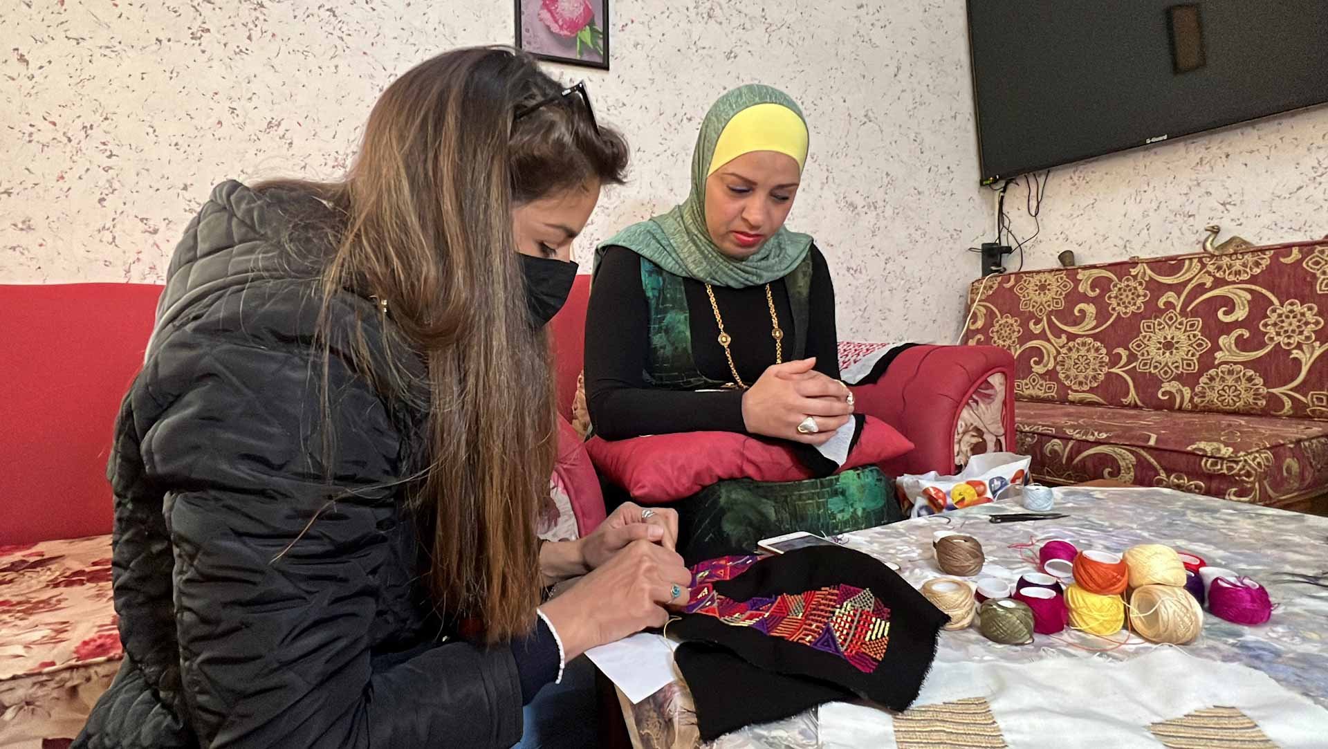 Image for the title: Culturally inspired shoes offer jobs for Jordanians 