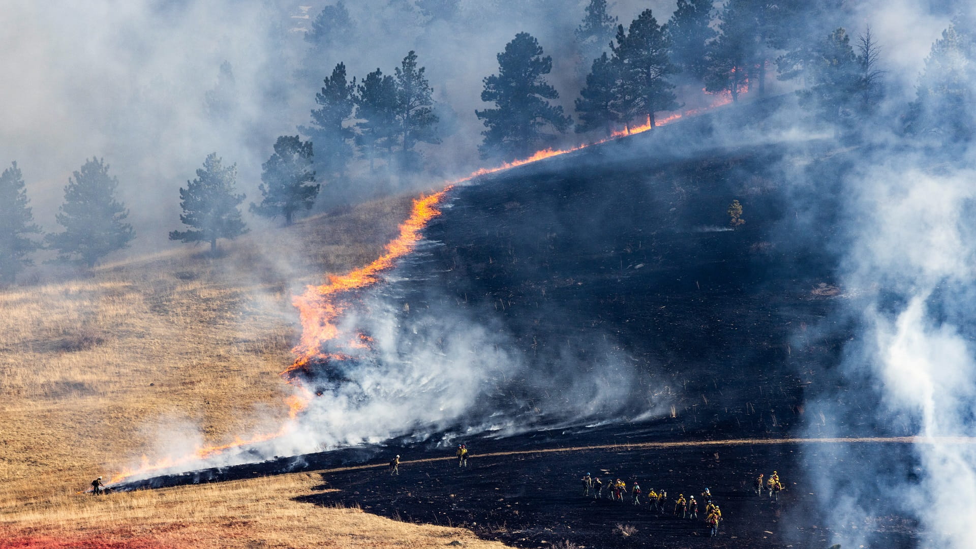 Image for the title: Thousands ordered evacuated as Colorado fights latest fire 