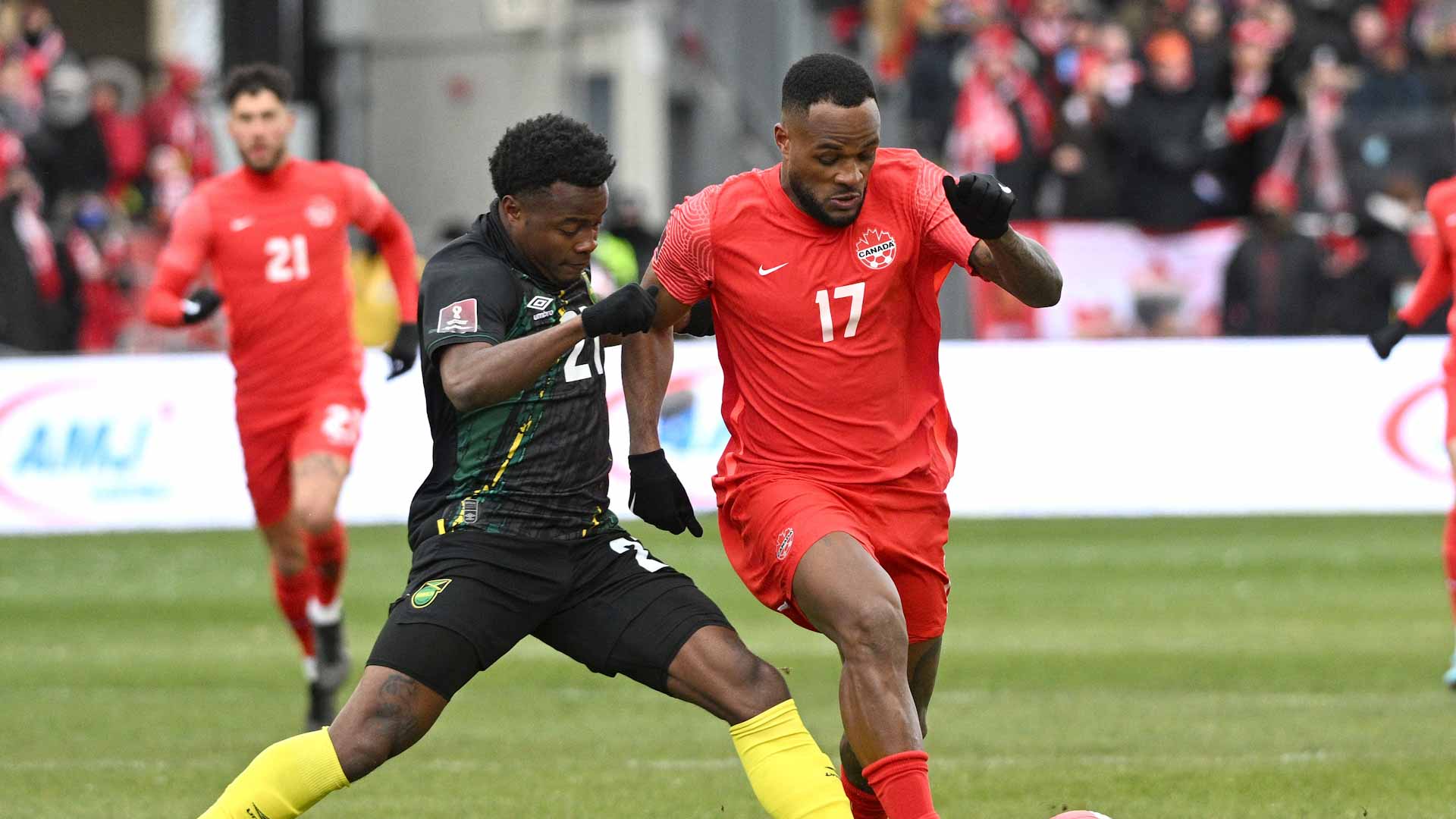 Image for the title: Canada beat Jamaica to end 36-year World Cup finals drought 
