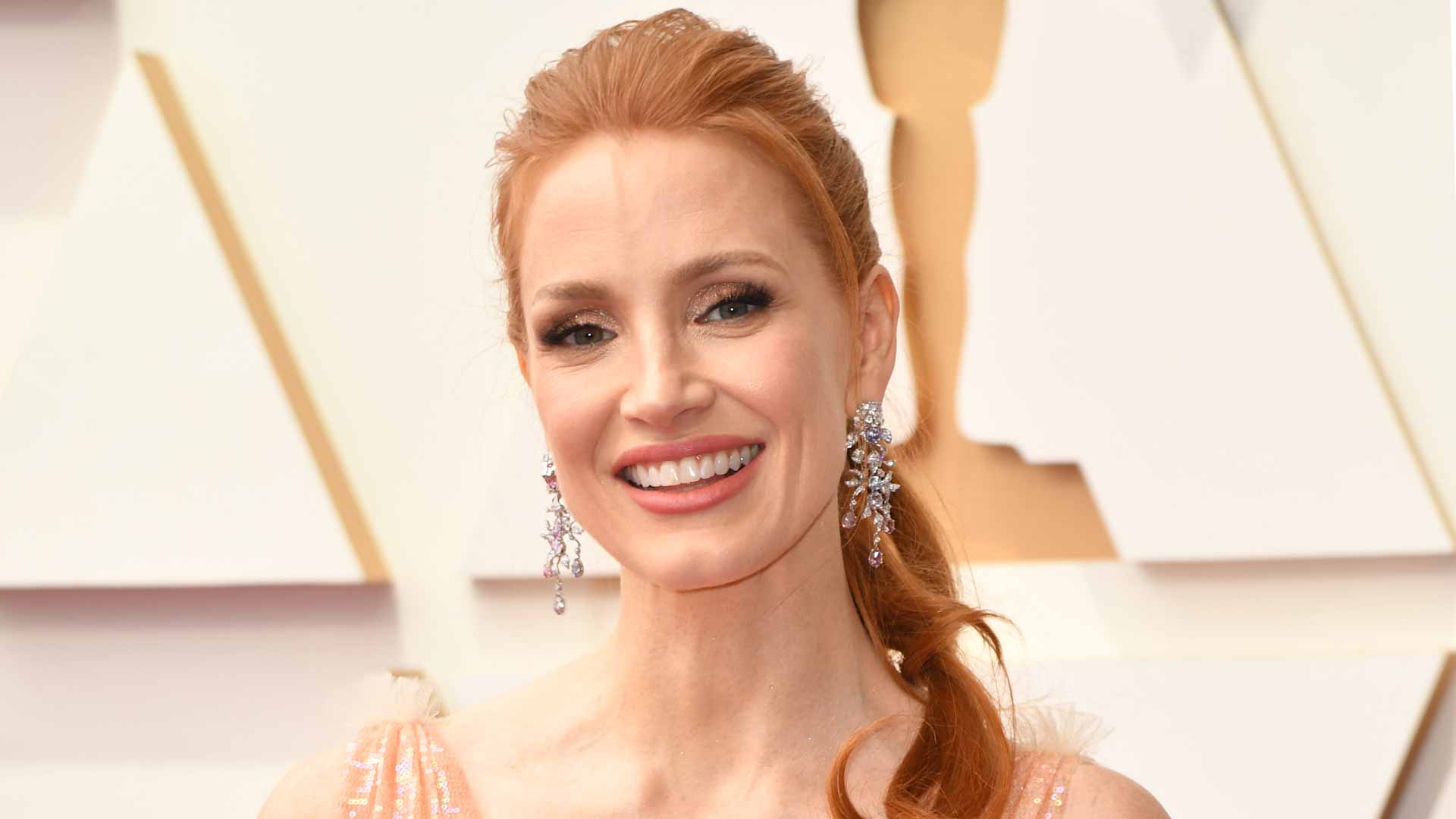 Image for the title: Stars bring color, glitter and some skin to Oscars red carpet 