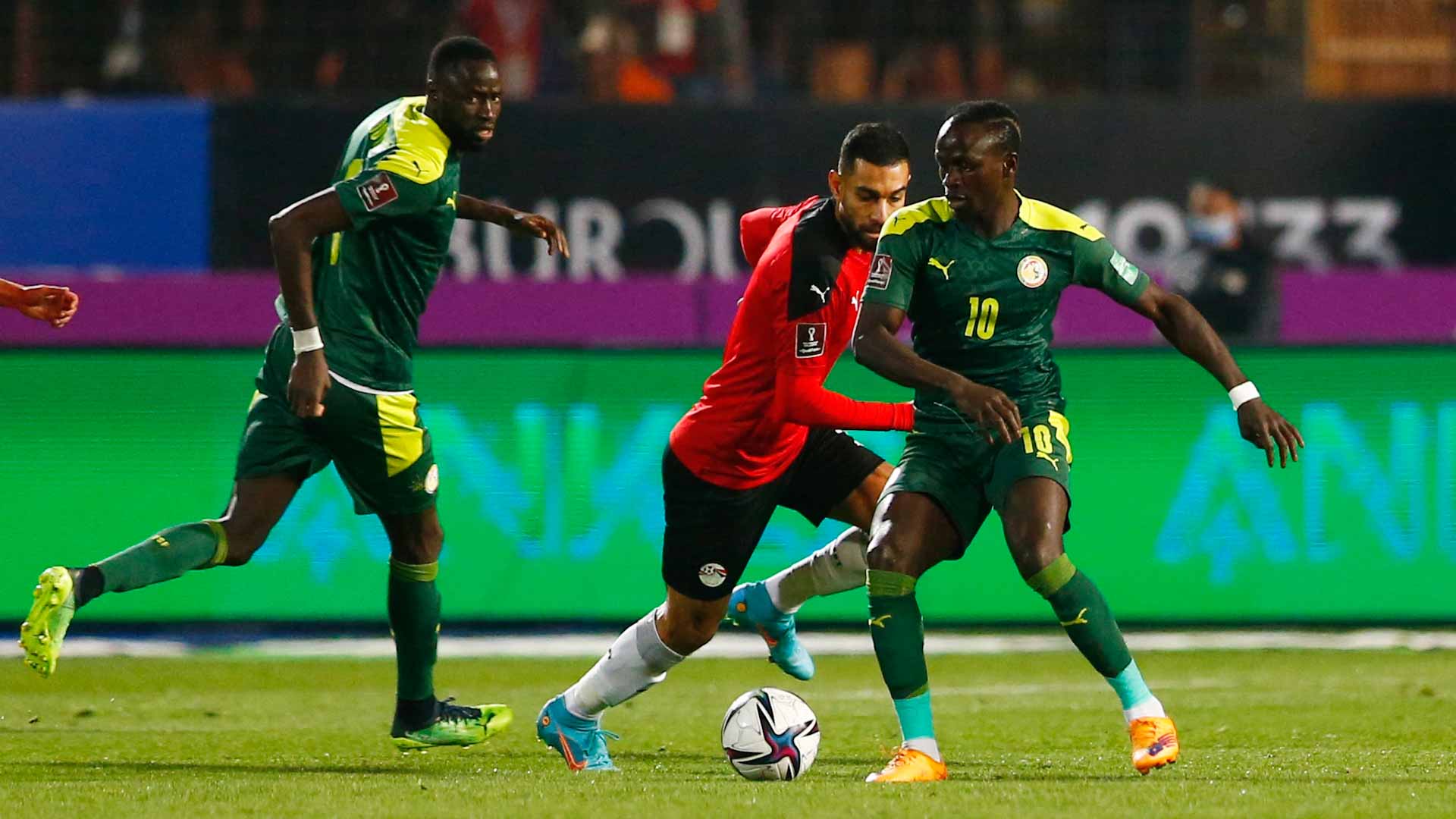 Image for the title: Mane fires winning penalty to propel Senegal to World Cup finals 