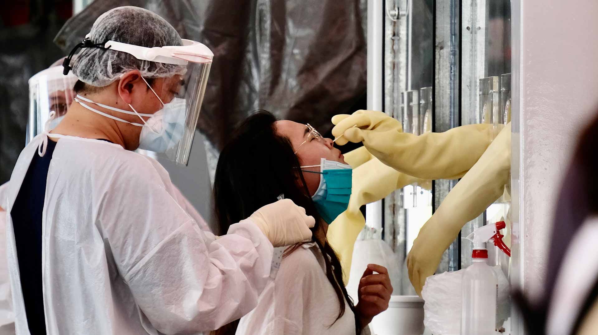 Image for the title: Taiwan cuts COVID quarantine for arrivals even as cases rise 