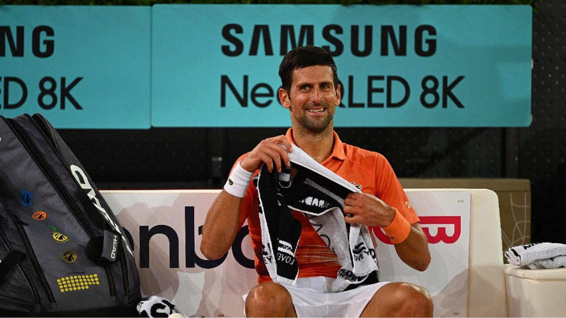 Image for the title: Djokovic beats Monfils to reach 3rd round at Madrid Open 