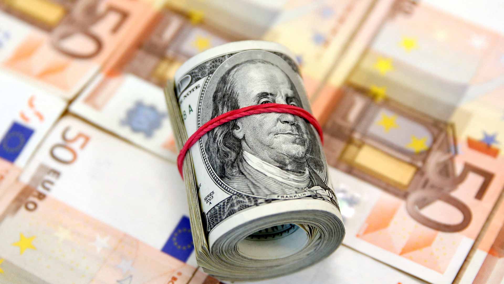 Image for the title: Dollar recoils as Fed douses hawkish bets 