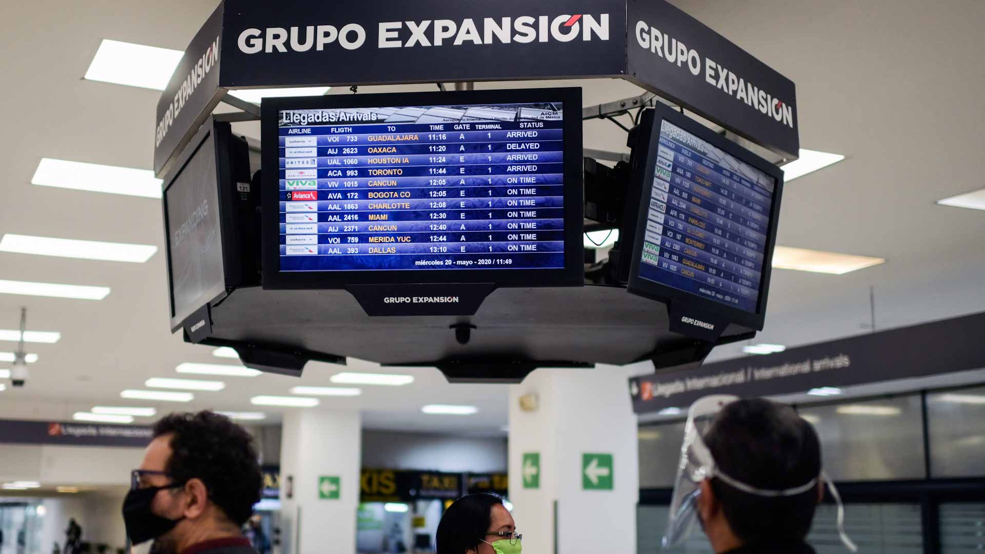 Image for the title: Mexico to cut flights at main airport after near-miss on runway 