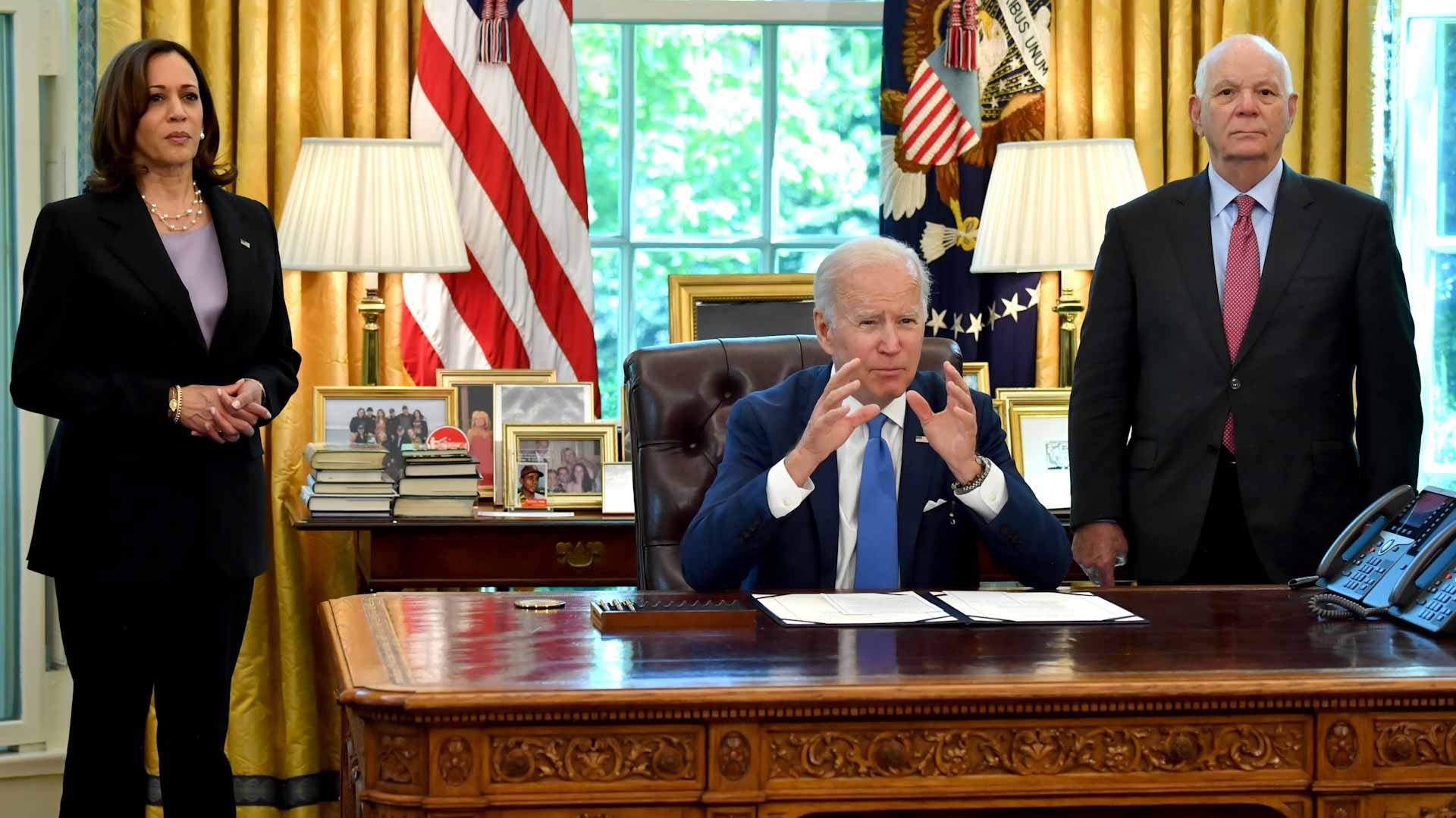 Image for the title: Biden signs measure speeding up US weapons deliveries to Ukraine 