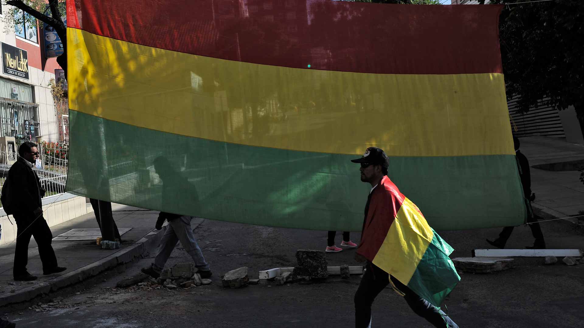 Image for the title: Four dead, 70 hurt in Bolivian university stampede 