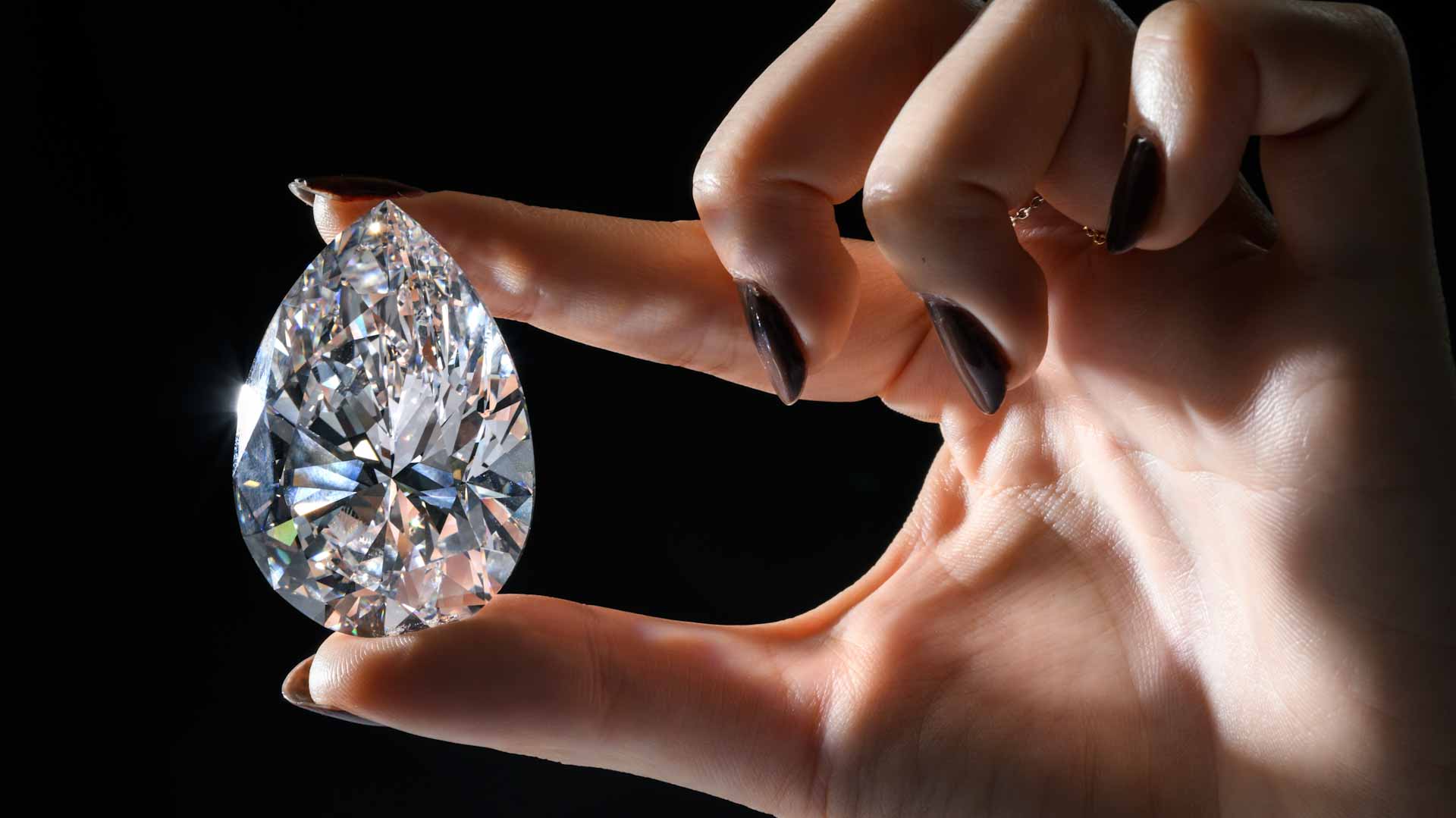 Image for the title: Biggest white diamond ever auctioned fetches $21.9 million 