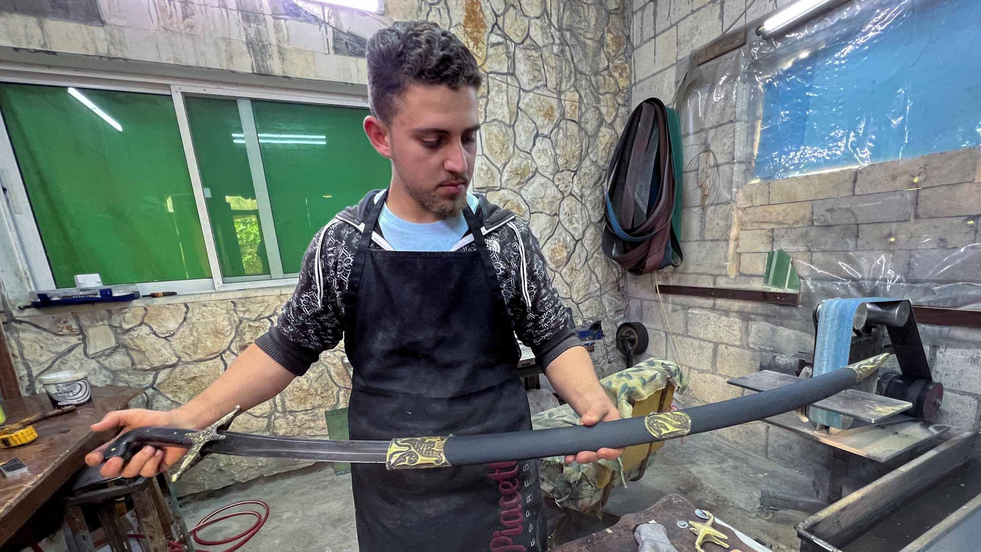 Image for the title: Jordanian craftsman makes swords out of car parts 