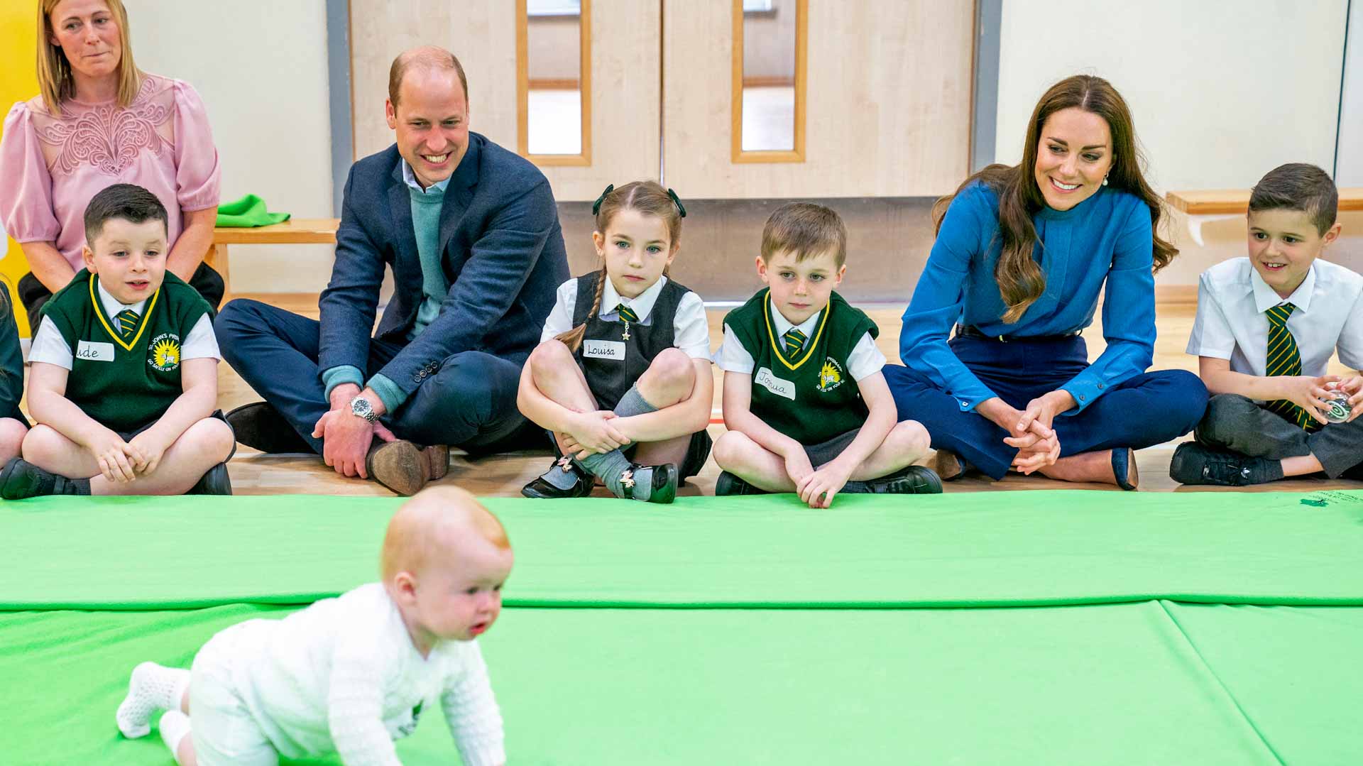 Image for the title: Prince William and Kate sing nursery rhymes during school visit 