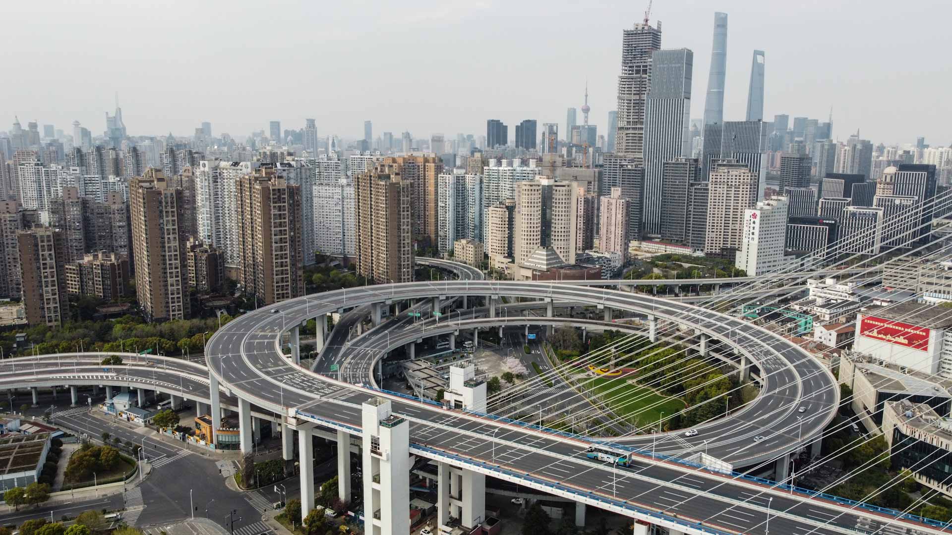 Image for the title: Shanghai targets June 1 return to normal as COVID cool economy 