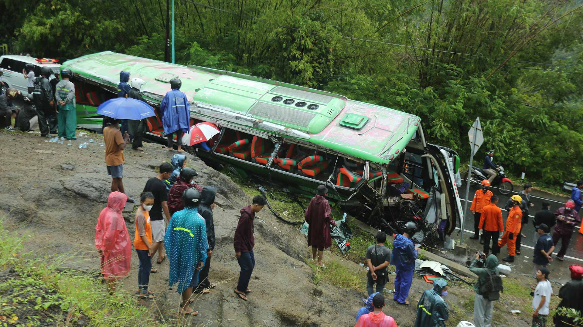 Image for the title: Indonesia tourist bus crash kills 14 