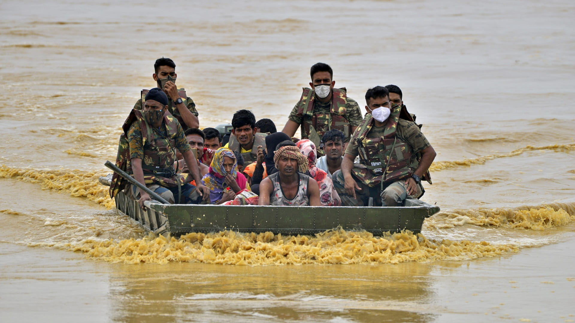 Image for the title: Millions stranded, dozens dead as flooding hits Bangladesh, India 