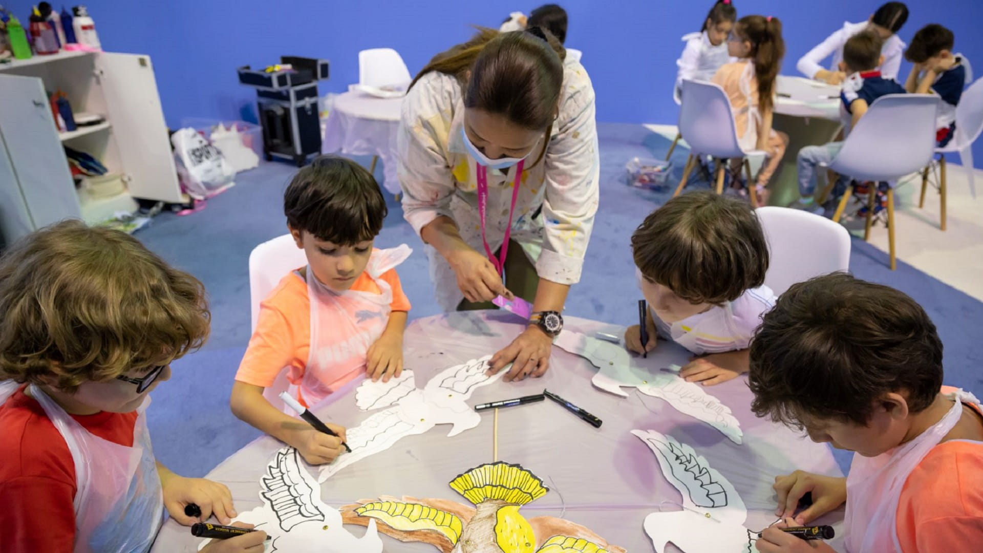 Image for the title: Young artists make UAE’s national bird soar high at 13th SCRF 