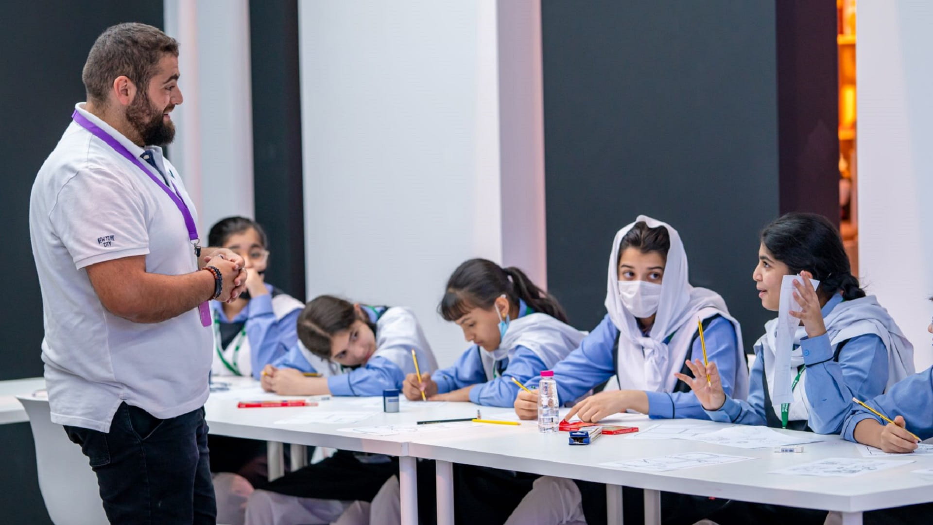 Image for the title: Young artists create personalised comic book pages at SCRF 2022 