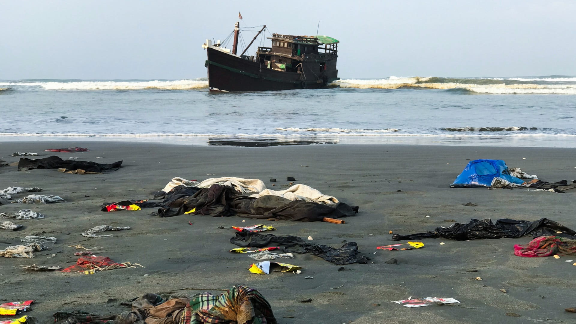 Image for the title: 14 bodies found washed up on Myanmar beach: official 
