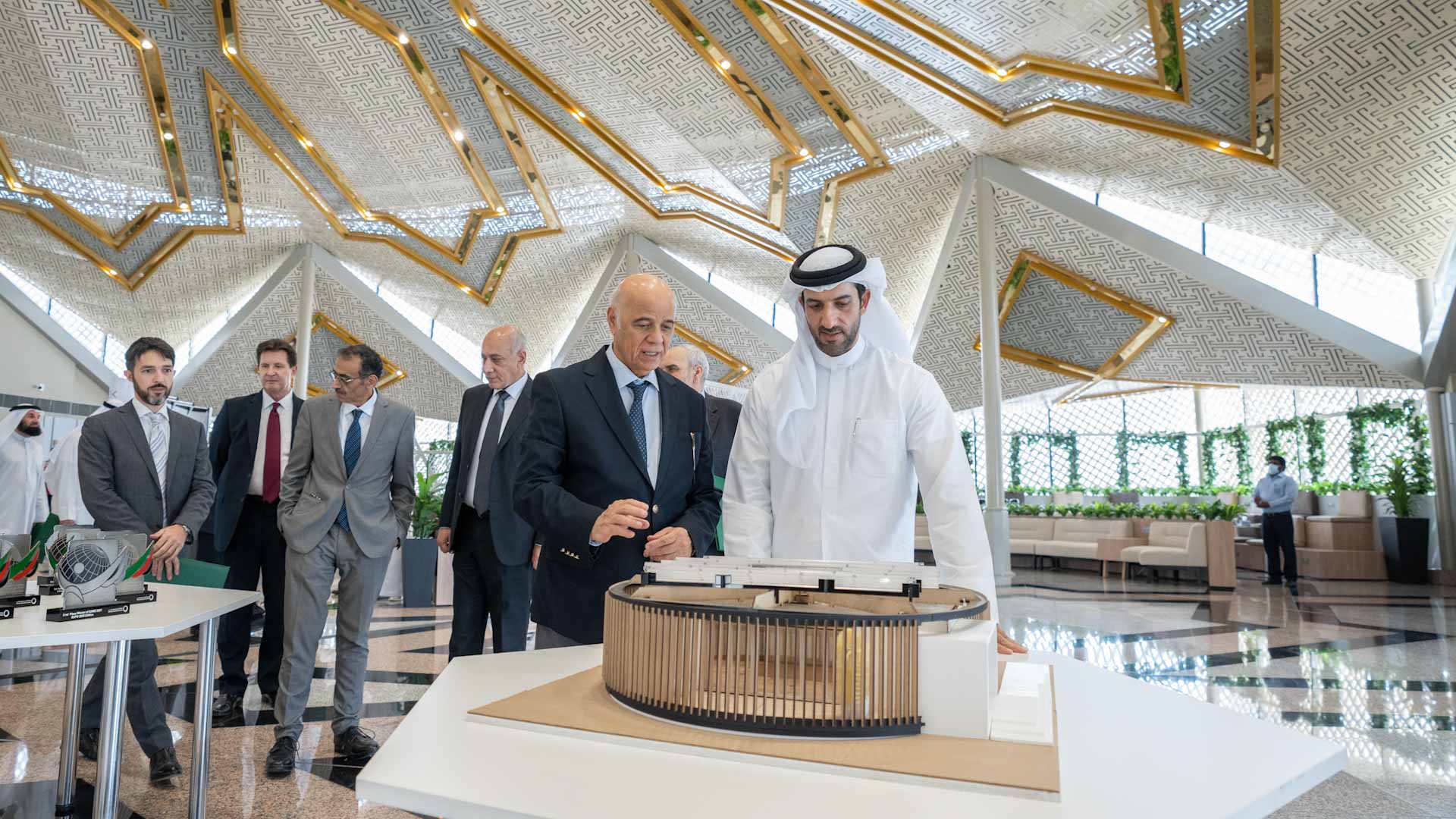Image for the title: Sultan bin Ahmed Al Qasimi inspects solar house at UoS 