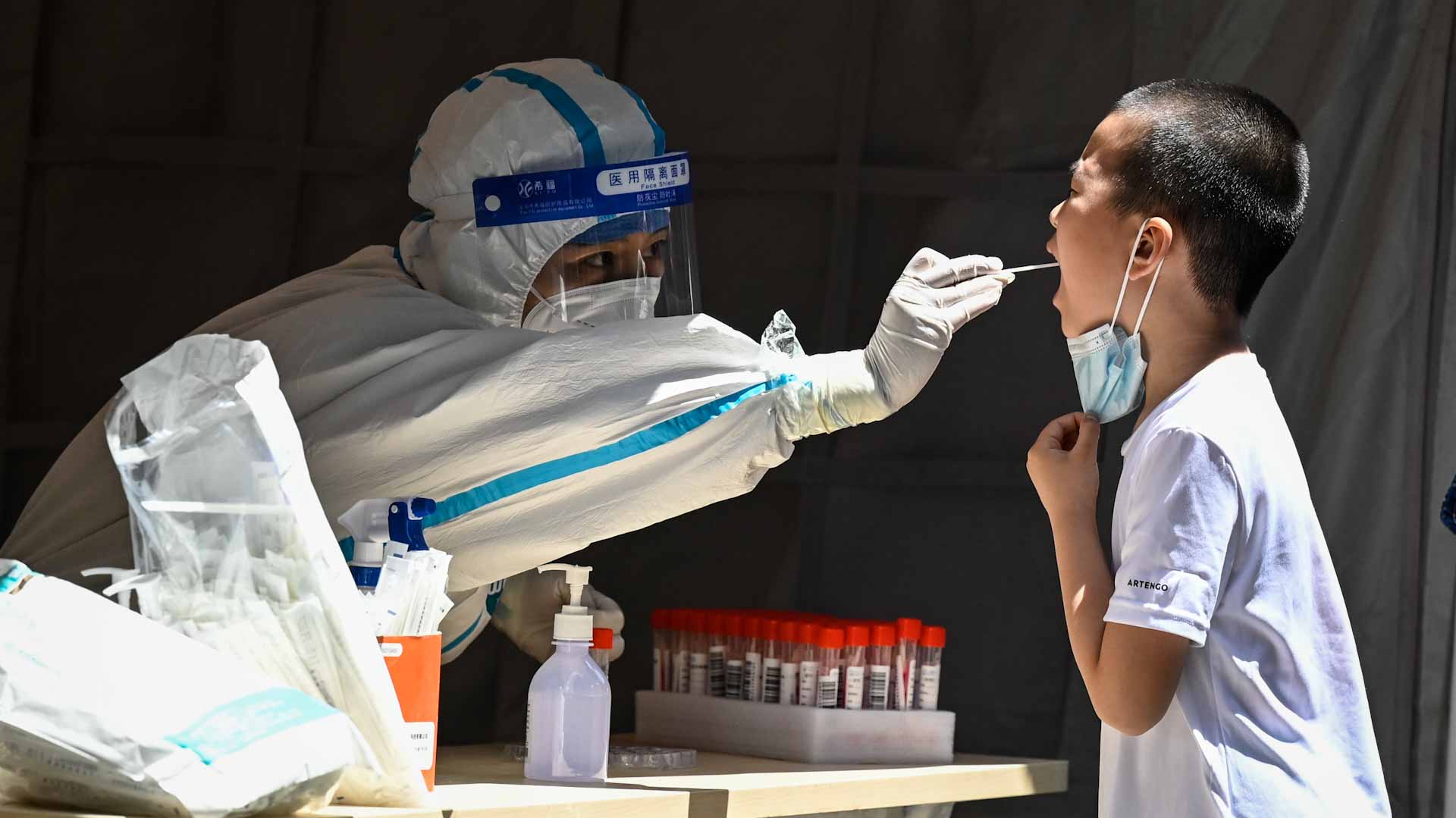 Image for the title: Tightening COVID net, Beijing deals out punishments 