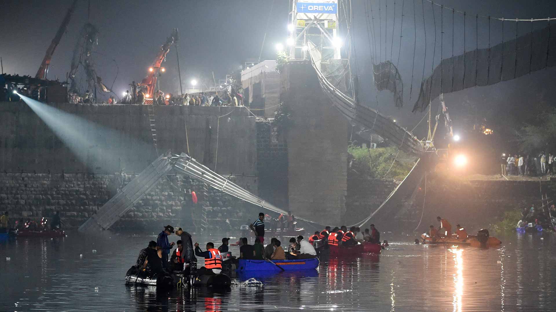 Image for the title: 135 died in Indian bridge collapse 