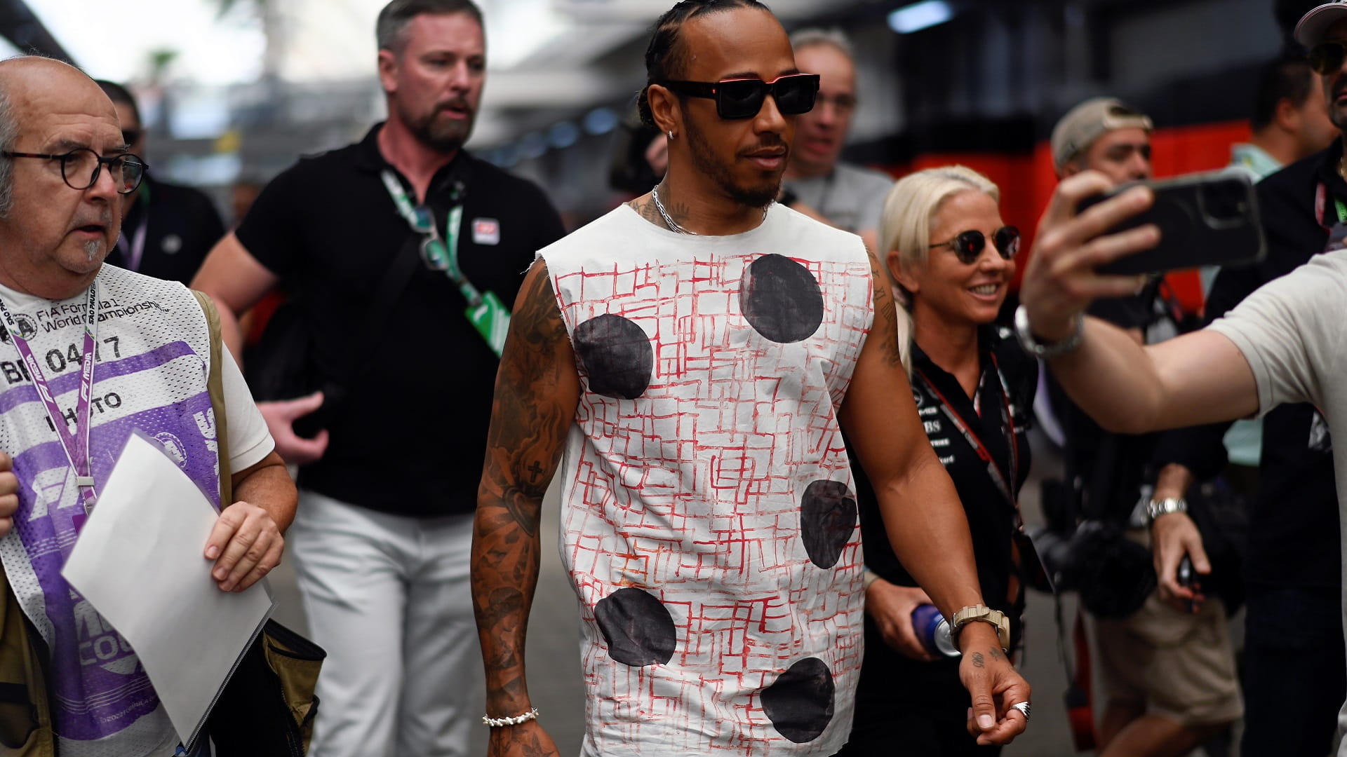 Image for the title: Hamilton wants to beat Ferrari to earn factory staff bonuses 