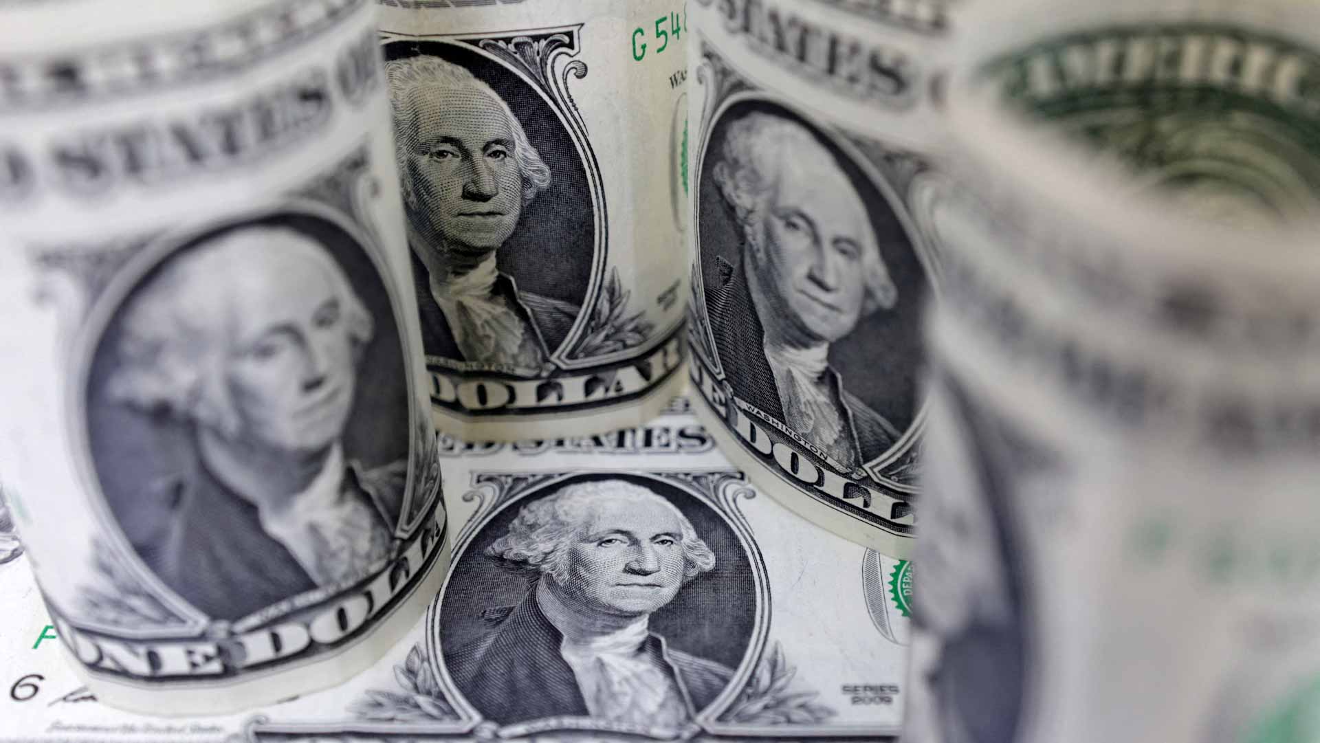 Image for the title: Dollar steadies as Fed cautions on inflation 