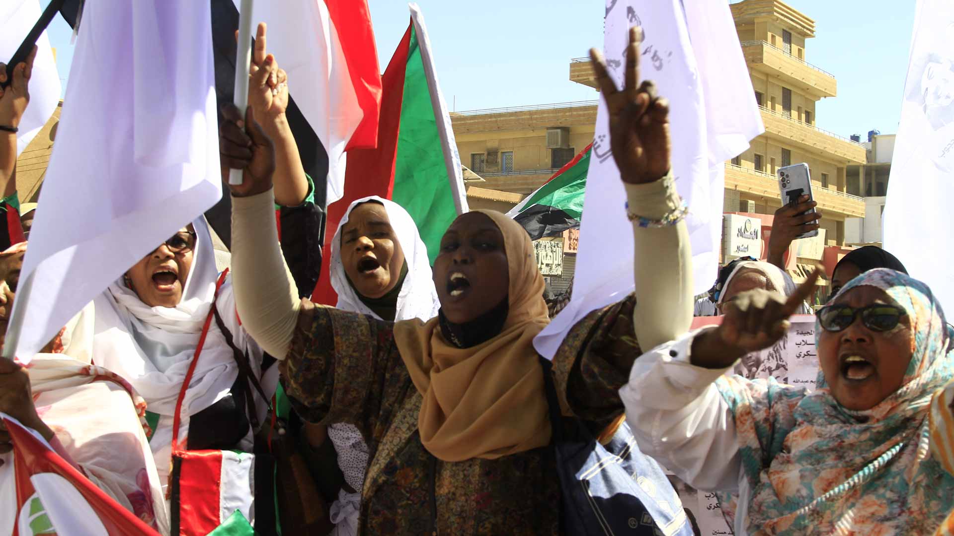 Image for the title: Thousands protest the coup in Sudan and demand justice 