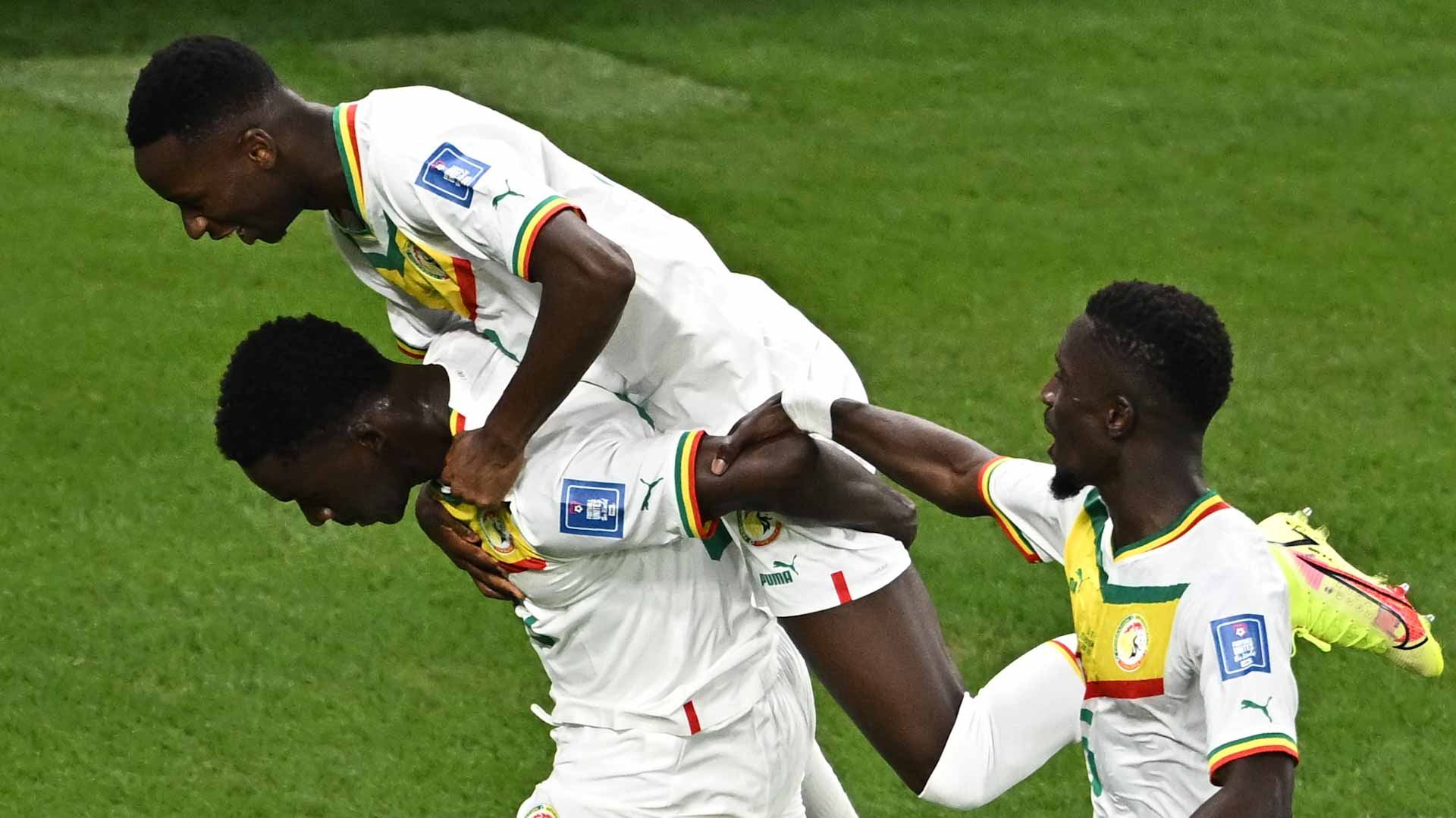 Image for the title: Senegal beats Qatar to leave World Cup 