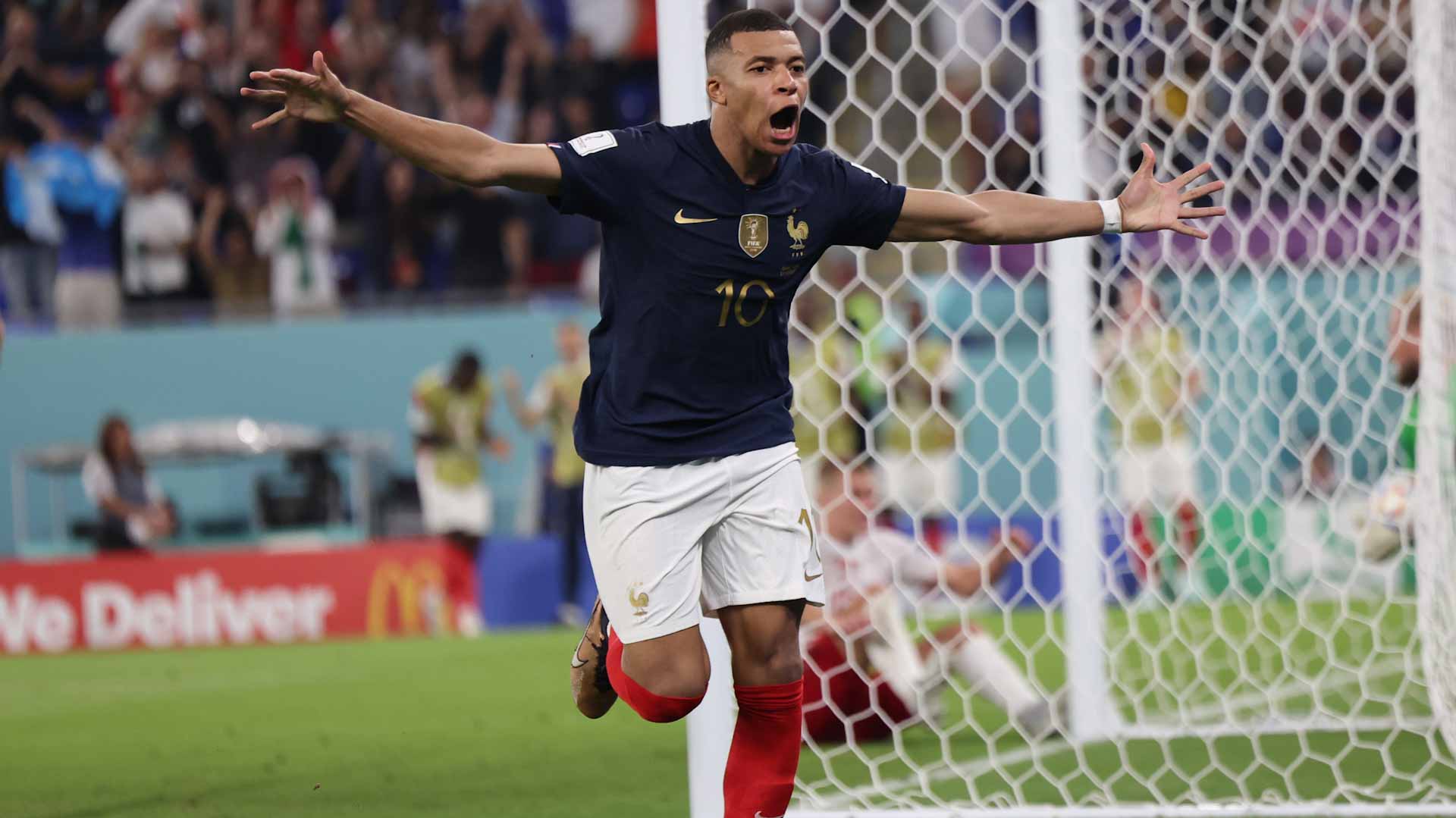 Image for the title: Mbappe double sinks Denmark taking France into World Cup last 16 