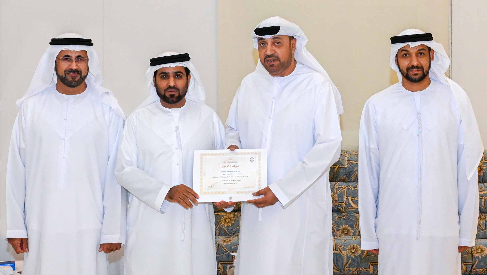 Image for the title: Bin Amer honours a number of distinguished officers 