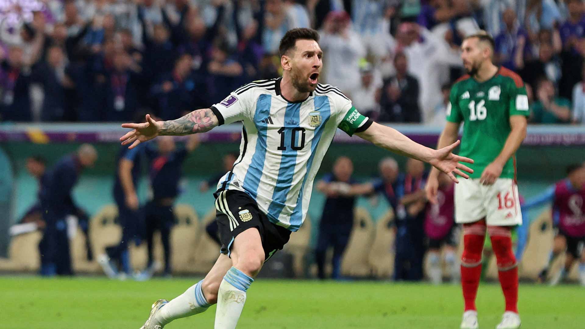 Image for the title: Messi magic guides relieved Argentina past Mexico 