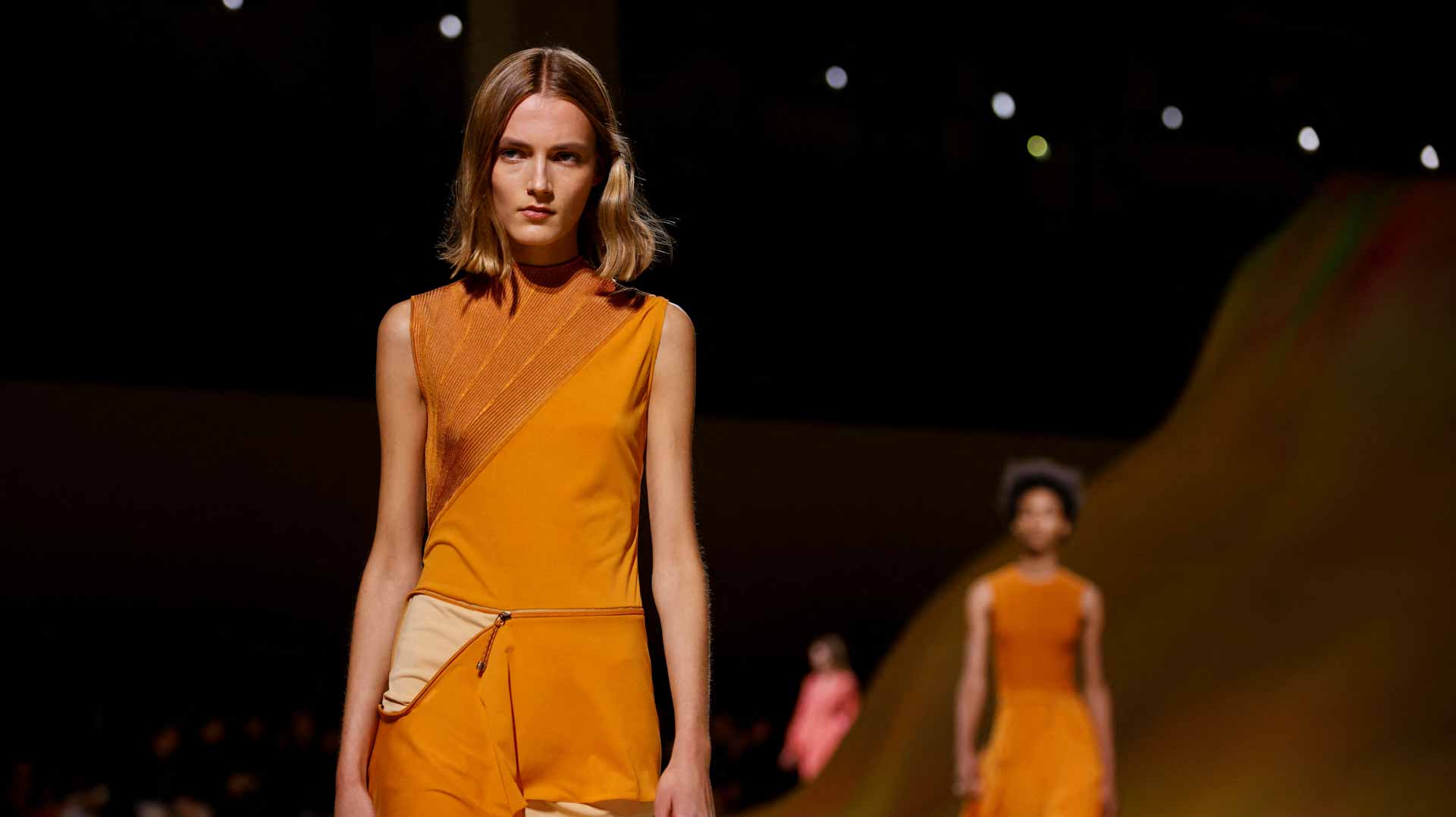 Image for the title: Hermes takes polished fashion to desert rave set at Paris Week 