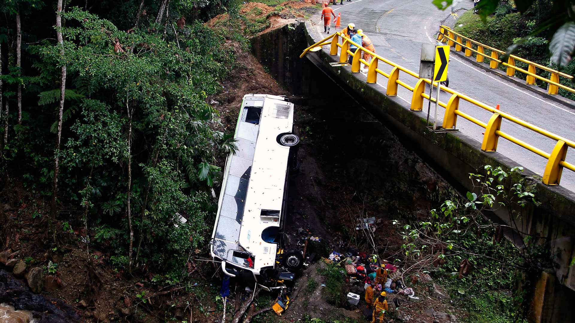 Image for the title: 25 dead after wedding bus falls into Indian gorge 