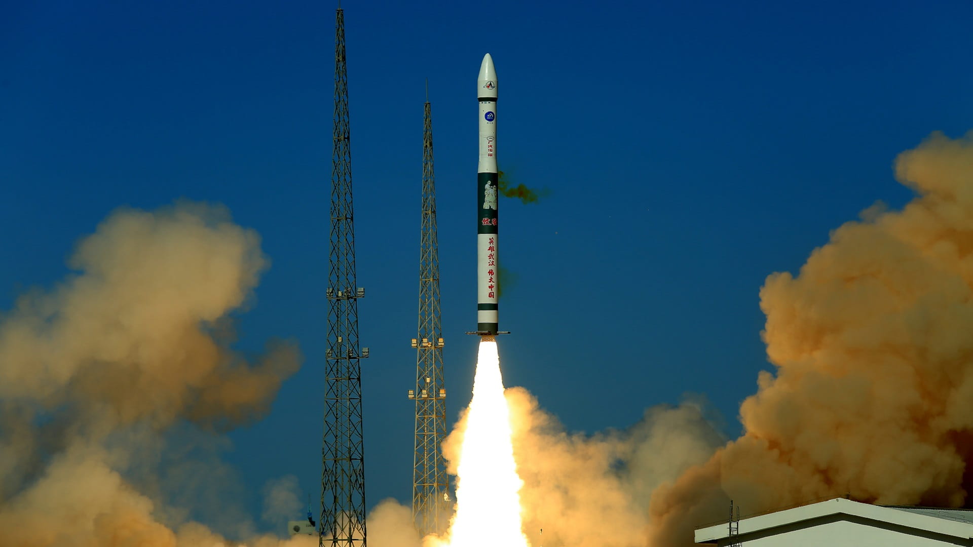 Image for the title: China sends two satellites into space via offshore rocket launch 