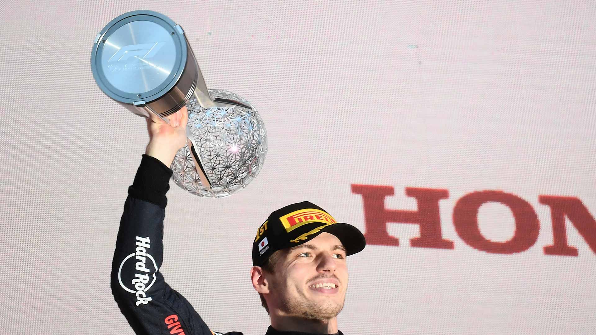 Image for the title: Verstappen retains F1 world championship after dramatic Japan GP 