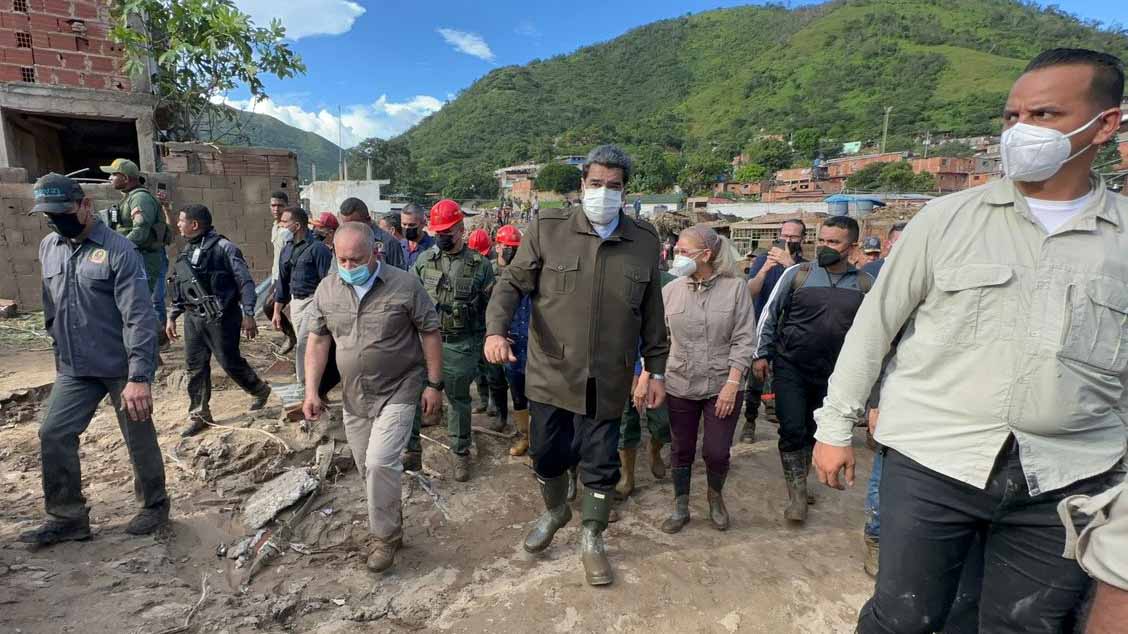 Image for the title: Venezuela's Maduro visits area affected by deadly landslide 