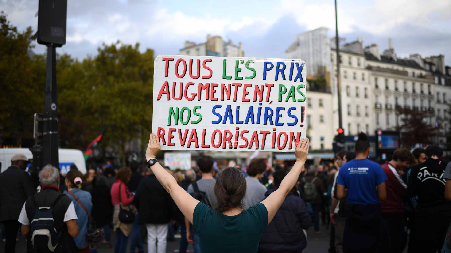 Image for the title: Thousands take to the streets of Paris to protest soaring prices 