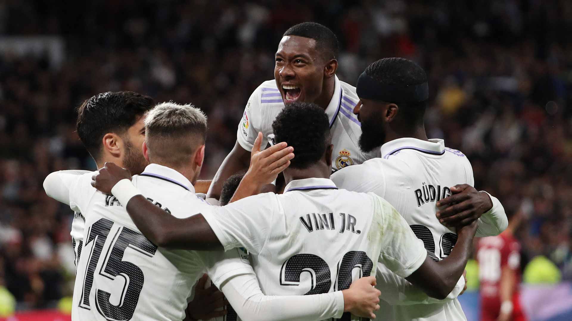 Image for the title: Real Madrid score two late goals to win 3-1 against Sevilla 