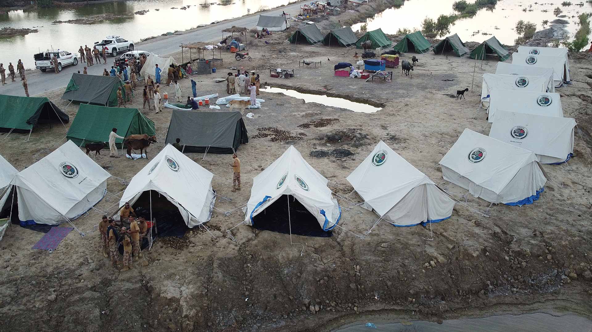 Image for the title: Pakistan floods wash away a family's marriage hopes 